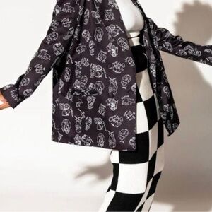 Dressed in Lala zodiac blazer